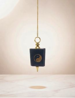 Pendule Yin Yang noir et doré : équilibre & intuition